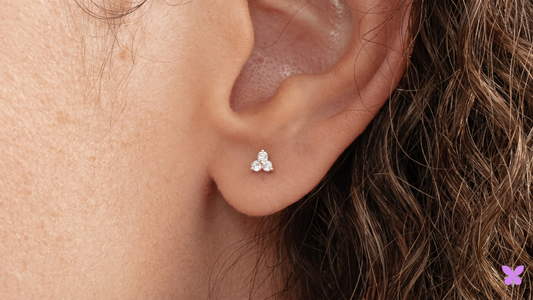 When is the first earring removed?